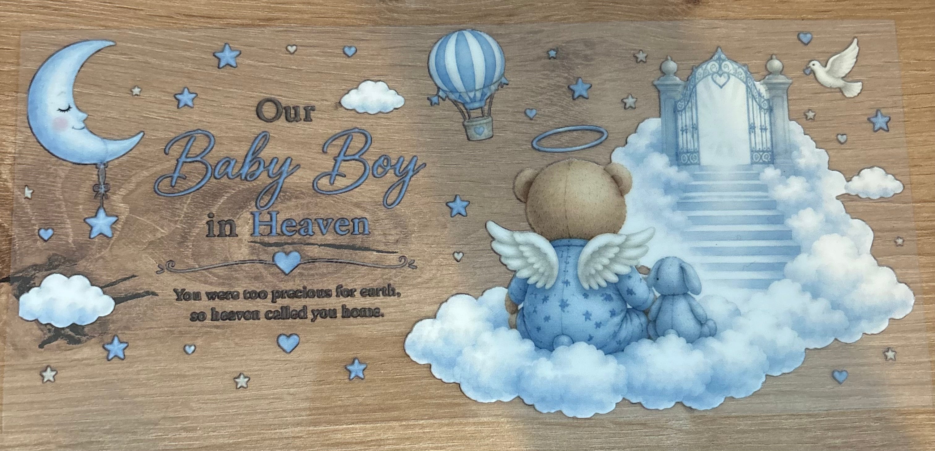 Baby boy in heaven wrap